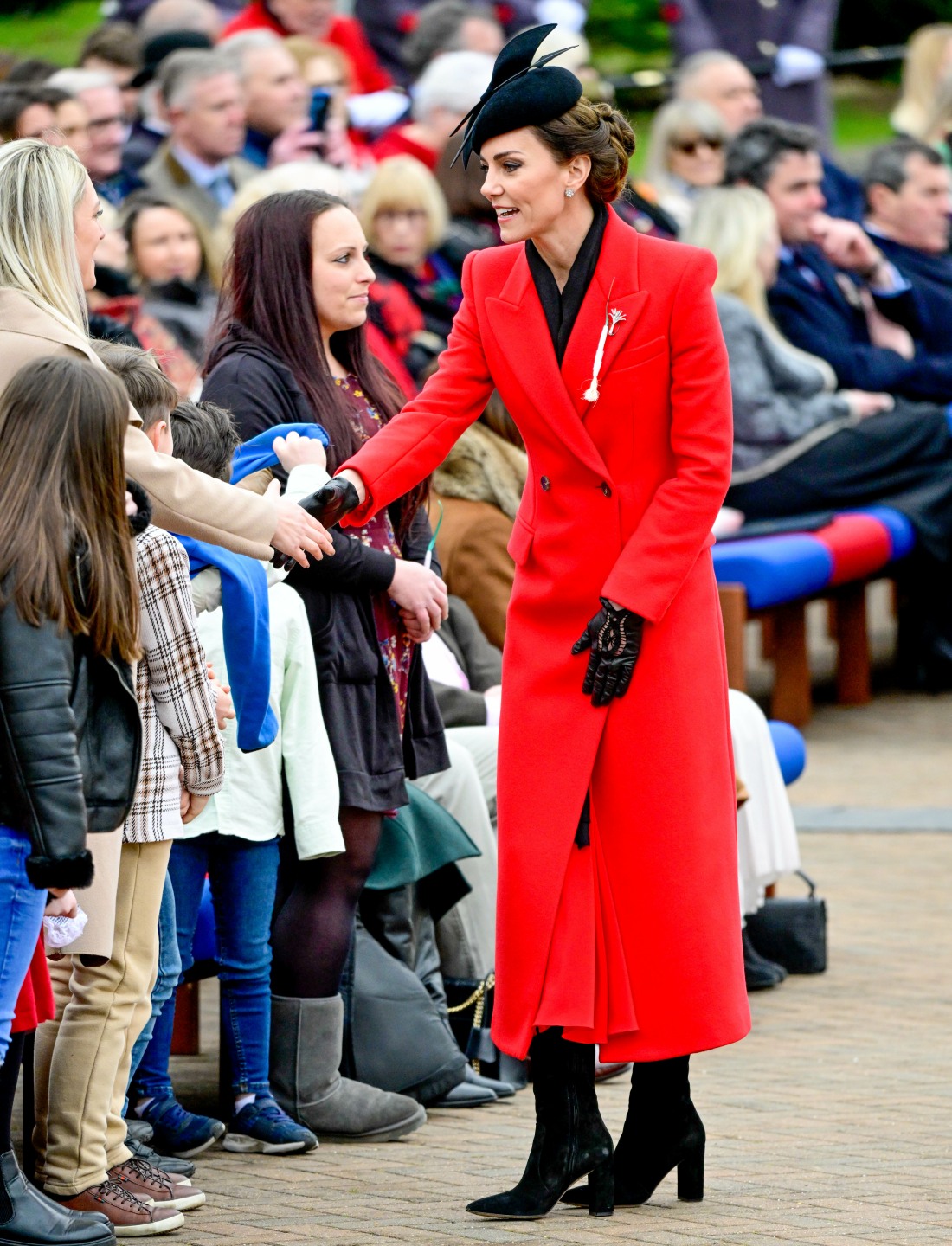 princess-kate-wore-a-red-mcqueen-coat-&-a-leek-brooch-for-st.-david’s-day