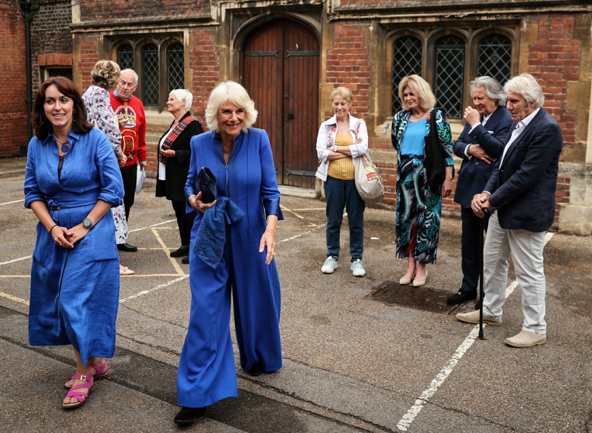 telegraph:-queen-camilla’s-gumby-jumpsuits-&-housedresses-are-so-fashionable!